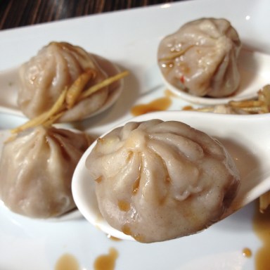 Soup Dumpling in the serving spoons