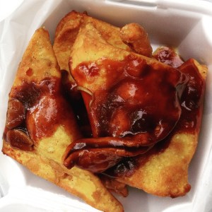 Crab and Cheese dumplings doused in brown ginger sauce