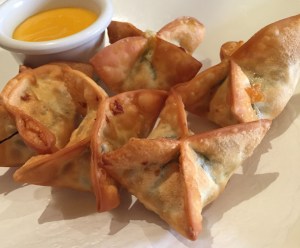 Wontons stuffed with soy cheese, spinach and watercress
